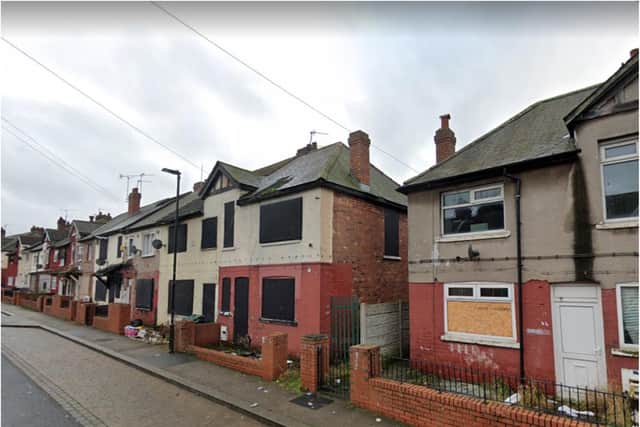 Scores of homes in Prince's Crescent are boarded up.