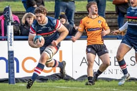 New deal: Thom Smith, scoring a try against Caldy, has signed to remain at Doncaster Knights next season.