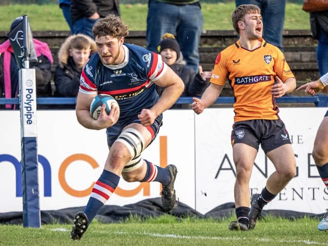 New deal: Thom Smith, scoring a try against Caldy, has signed to remain at Doncaster Knights next season.