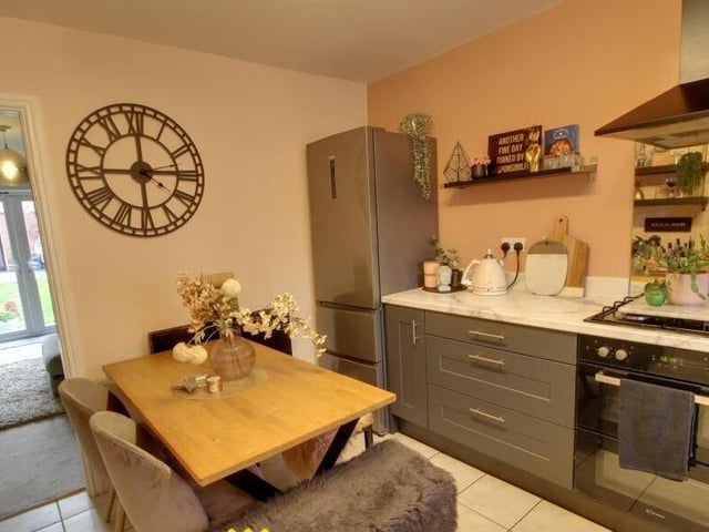 The dining kitchen with a glimpse of the lounge.