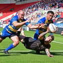 Doncaster’s Brad Hey and Bureta Faraimo in action against Barrow. Picture: Andrew Roe/AHPIX LTD