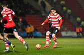 Doncaster Rovers remain in the top three despite defeat at Chesterfield on Friday night.