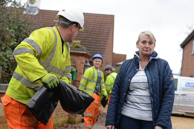 Pam Webb, pictured taking delivery of Sandbags for her home and business. Picture: NDFP-19-01-21-FloodAlert Fishlake 6-NMSY