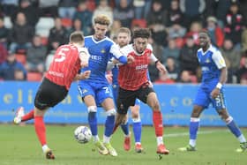 Josh Martin in action against Cheltenham Town. Picture: Howard Roe/AHPIX LTD