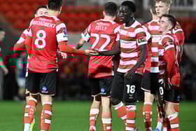 George Broadbent celebrates scoring Rovers' third goal.