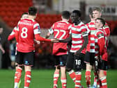 George Broadbent celebrates scoring Rovers' third goal.