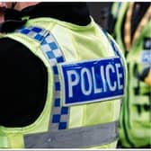 A major Doncaster road was sealed off after a woman was seriously injured in a collision with a car.