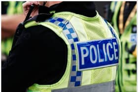 A major Doncaster road was sealed off after a woman was seriously injured in a collision with a car.