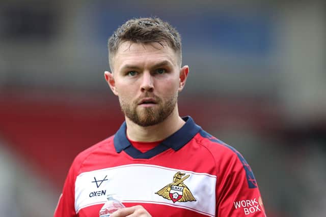 Glenn Middleton has left Doncaster Rovers to join League Two side Rochdale