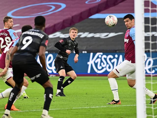 Matt Smith fires on goal against West Ham. Picture: Howard Roe/AHPIX