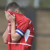 Tommy Rowe shows his disappointment following the final whistle at Shrewsbury. Picture: Howard Roe/AHPIX LTD