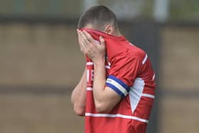 Tommy Rowe shows his disappointment following the final whistle at Shrewsbury. Picture: Howard Roe/AHPIX LTD