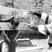 Not many people can say that they have been placed in the stocks at Conisbrough Castle but back in 1992 nine year old William Hyland from Conisbrough had the honour. He is assisted by Nigel Pettitt and Jonathon Martin.