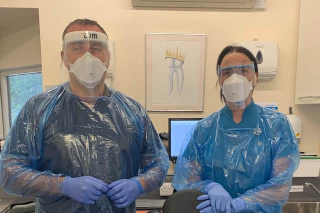 Doncaster Dentist John Gatus and dental assistant NIcky in PPE