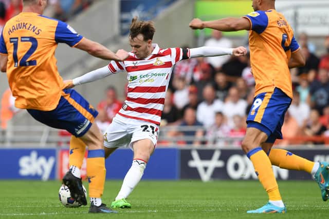 Doncaster's Kyle Hurst has a shot at goal against the Stags.