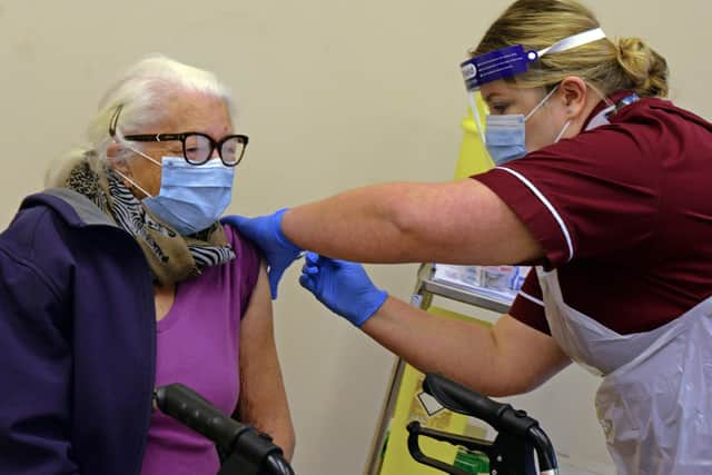 Ann Duggan, is the first to recieve the Covid-19 Vaccination in Doncaster. Picture: NDFP-15-12-20-CovidVaccine 4-NMSY