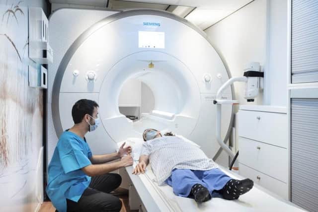The CT scanner at work