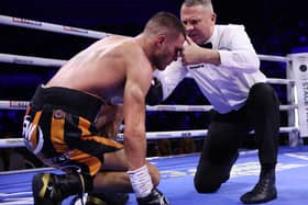 Doncaster-trained boxer Connor Coghill is given a standing eight count by referee Bob Williams.Photo: Mark Robinson/Matchroom Boxing