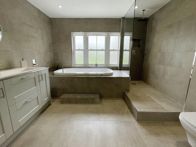 One of four luxurious en suite bathrooms.