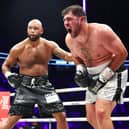MANCHESTER, ENGLAND - SEPTEMBER 02: David Allen reacts after a low punch during his Heavyweight Contest fight against Frazer Clarke at Manchester Arena on September 02, 2023 in Manchester, England. (Photo by Matt McNulty/Getty Images)
