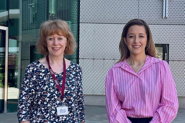 Deborah Rees and Sally Jameson MP stand in front of the Cast building smiling