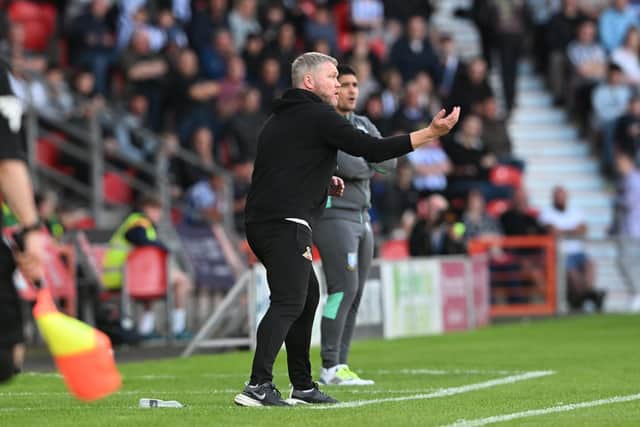 Doncaster's Grant McCann dishes out instructions from the touchline.