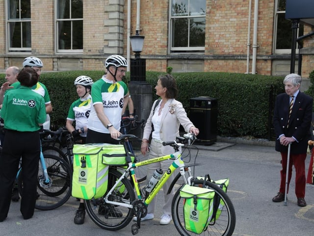 The Lord Lieutenant of North Yorkshire, Mrs Joanna Ropner, discussing the bike