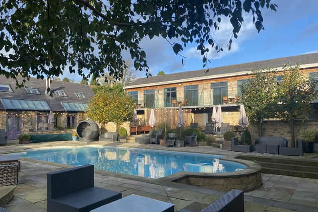 The outdoor heated swimming pool has pretty terrace surroundings. Image: Feversham Arms