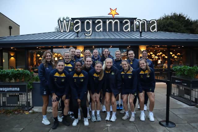 The Doncaster Belles football team outside Wagamama’s