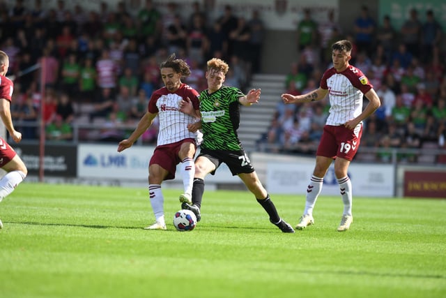 Doncaster's Bobby Faulkner challenges for the ball against Northampton Town.
