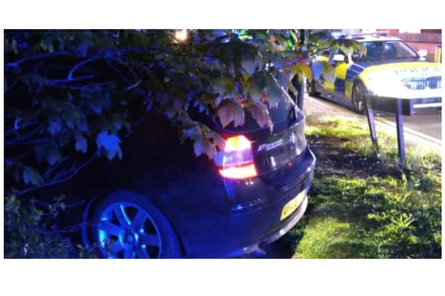The hapless driver smashed into a hedgerow while attempting to flee police.