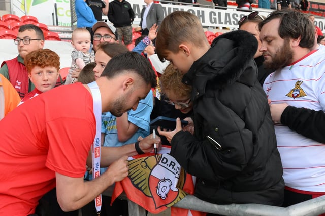 Rovers fans gathered to see the League Two trophy being paraded and meet players and staff as part of the club's title celebration event.