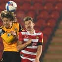 Andy Butler tangles with Wolves' record signing Fabio Silva. Picture: Andrew Roe/AHPIX