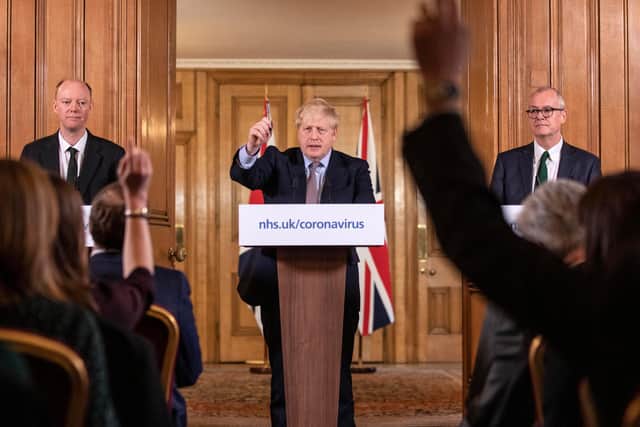 Prime Minister Boris Johnson gives a press conference on the ongoing situation with the coronavirus pandemic with chief medical officer Chris Whitty and Chief scientific officer Sir Patrick Vallance (Photo by Richard Pohle - WPA Pool/Getty Images)