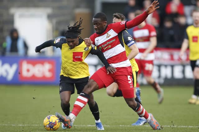 Joseph Olowu and his Doncaster Rovers team-mates struggled to contain Harrogate Town's man of the match, Abraham Odoh. Pictures: Paul Thompson/ProSportsImages