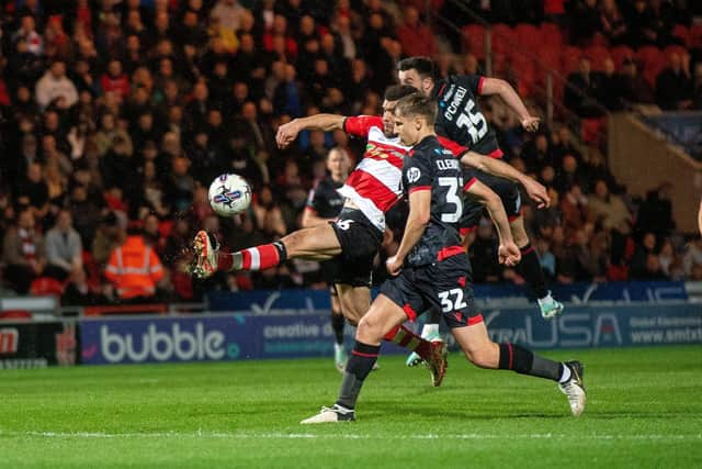 TRUYING HIS LUCK: Maxime Biamou gets a shot in for Doncaster Rovers