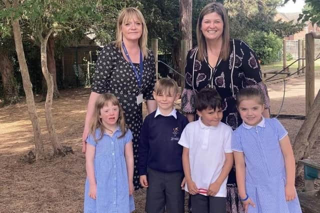 Kay Godfrey (on the left) with Michelle Cockayne and academy pupils
