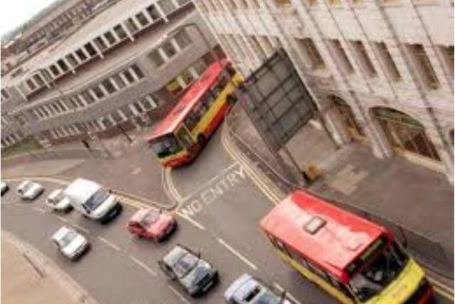 Buses exiting the old North Bus Station in the 1990s.
