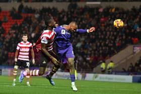 Joseph Olowu and Kyle Hurst (left) engage in a healthy rivalry away from the football pitch.