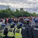 The girl threw rocks at police at the asylum seeker hotel riot to impress a boy, a court heard.