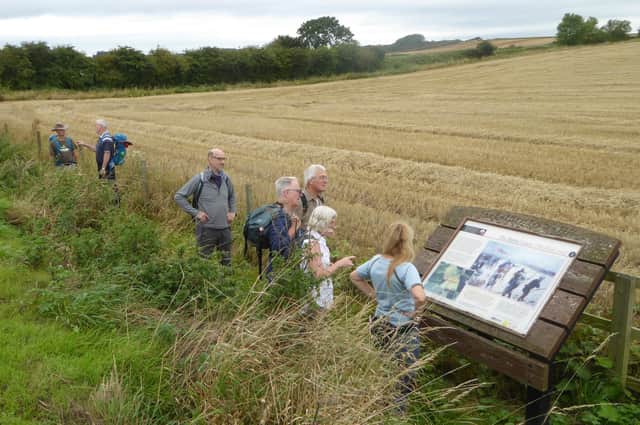 Doncaster Ramblers inspect an information panel on the Battle of Towton trail