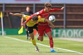 Rovers' goalscorer Josh Martin battles with Oxford's Luke McNally. Picture: Gareth Williams/AHPIX LTD