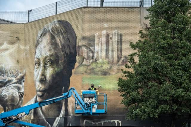 Conisbrough Castle has been added to the mural. 
Photo by: Street Art Atlas