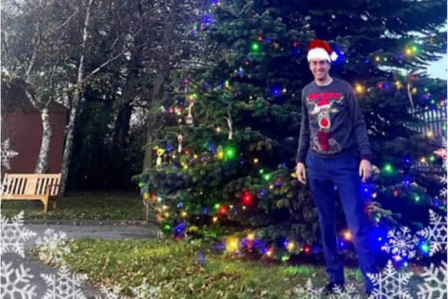 Ed Miliband poses in front of the tree in Scawsby.