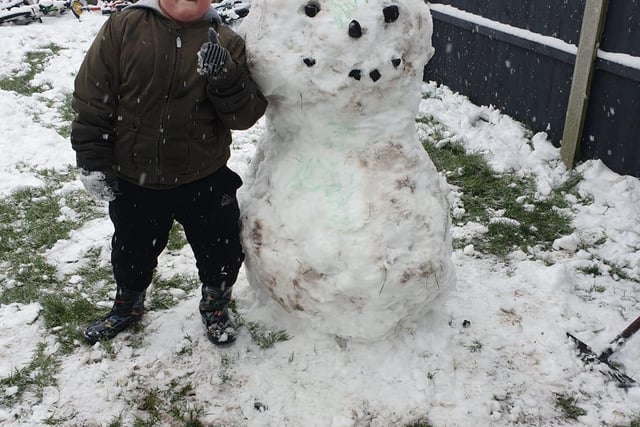 Snowman building in Bolsover. Sent in by Becky Fox.