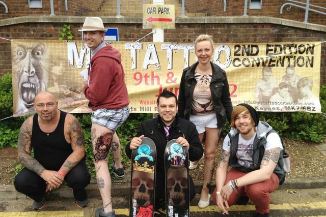 Johny D Matthews and his team show off the award-winning tattoo in 2012