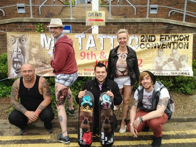 Johny D Matthews and his team show off the award-winning tattoo in 2012