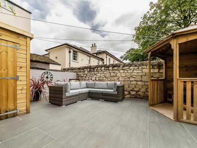 This rear courtyard area is large enough for entertaining.