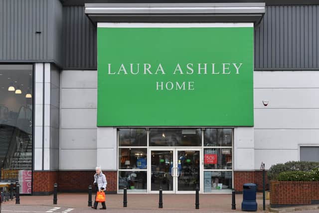British clothing and household goods retailer Laura Ashley Holdings collapsed Tuesday, March 17 into administration as rescue talks failed due to coronavirus turmoil, risking up to 2,700 jobs. (Photo by Paul ELLIS / AFP)