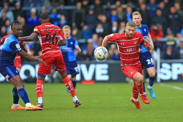 Adam Clayton bursts forward against Wycombe. Picture: Gareth Williams/AHPIX LTD
